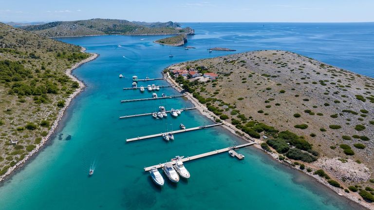 ACI Marina Piškera in Kornati National Park with yachts moored between rocky islands