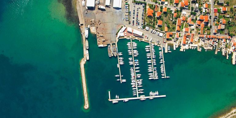 Marina Betina with vessels and Betina waterfront on Murter coast