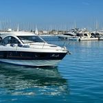 Monifa glides gracefully through tranquil waters, showcasing its sleek profile and elegant design.
