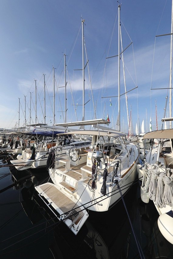 Angel07 docked in a prestigious marina, showcasing its elegant lines and luxurious amenities.