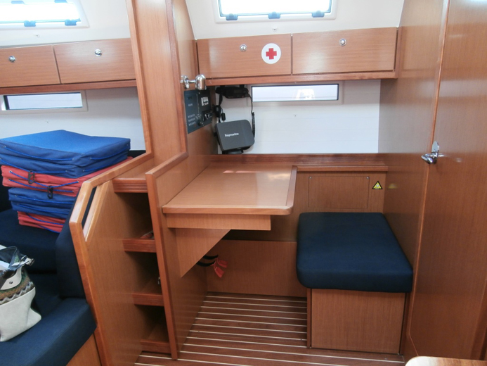 Elegant interior of Monika featuring warm wood finishes and cozy seating area.