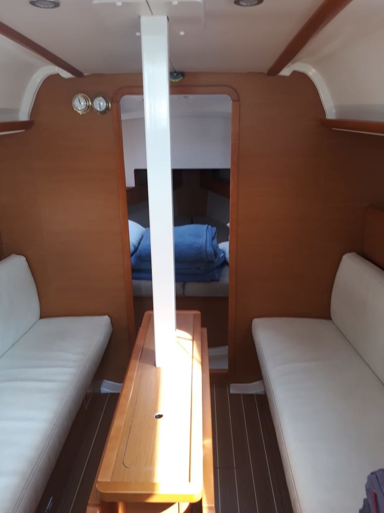 Luxurious interior of Britannia featuring elegant wood finishes and comfortable seating.