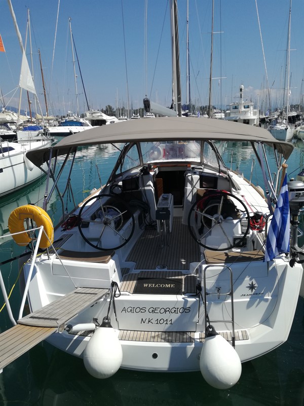 Elegant cockpit of Agios Georgios, showcasing dual steering wheels and inviting seating area.
