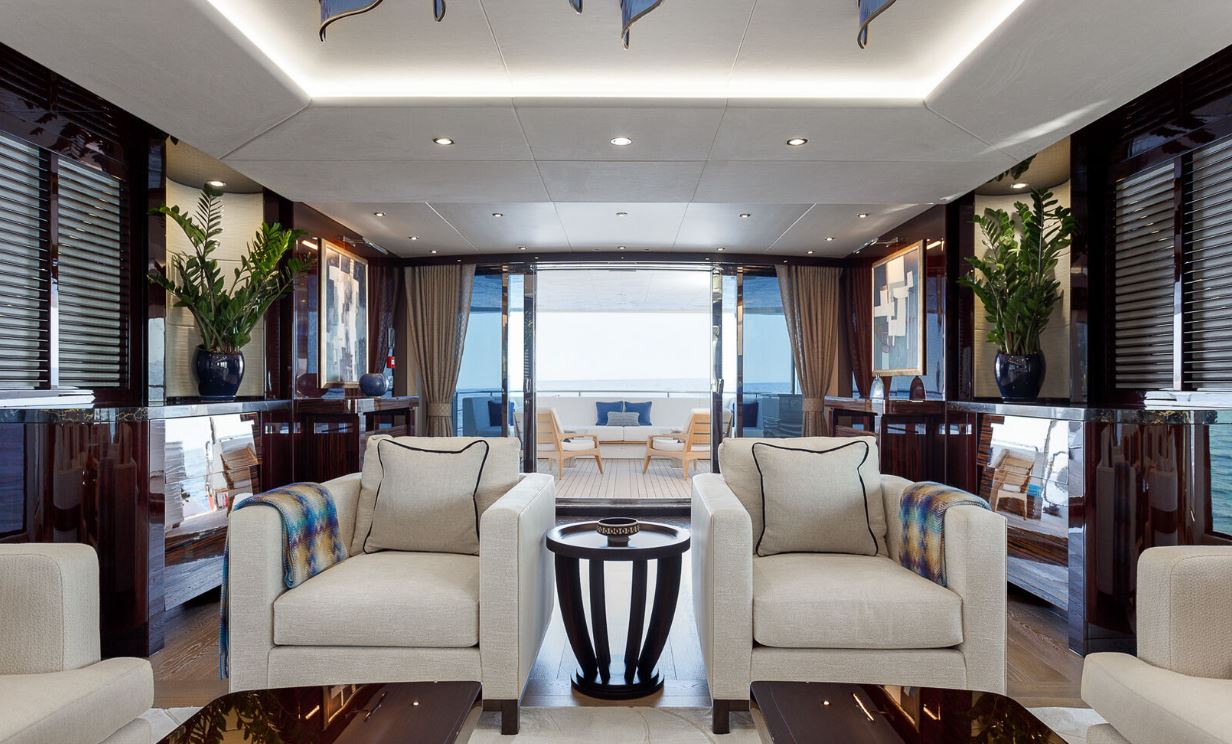 Elegant interior of NO.9 featuring plush seating, modern decor, and panoramic ocean views.