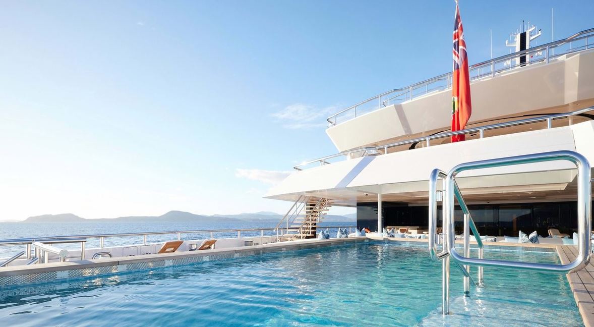 Custom Renaissance's expansive pool deck offers stunning views and luxurious lounging areas.