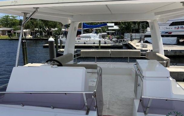 Spacious cockpit of Nautitech 47 Power, featuring sleek lines and luxurious seating.
