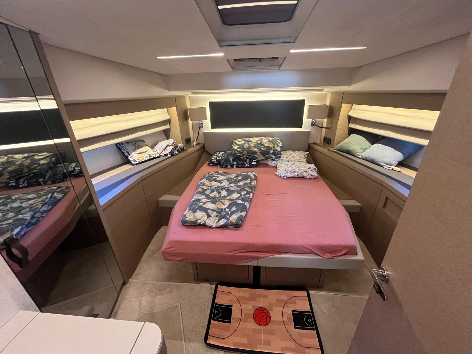 Luxurious interior cabin of the 590 Fly 2021 featuring elegant materials and ambient lighting.