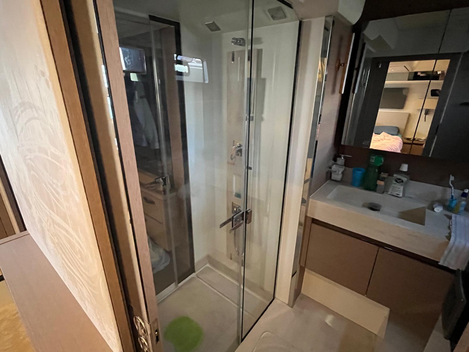 Luxurious shower enclosure in the 590 Fly 2021, featuring modern fixtures and elegant design.