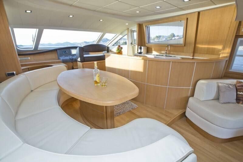Elegant interior of the 70 2007 yacht featuring a spacious lounge area with natural light.