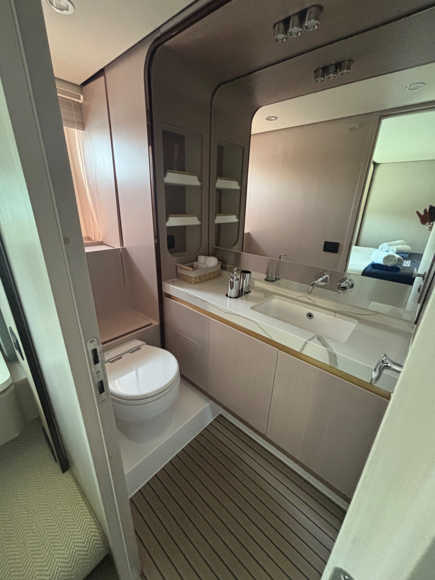 Luxurious bathroom in the Azimut 60 HT 2023 featuring elegant materials and modern design.