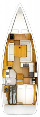 Spacious and elegantly designed interior of b'elli featuring warm wood tones and modern amenities.