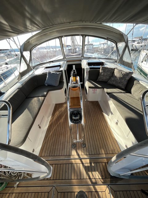 Luxurious interior of Zsiber featuring elegant seating and rich wooden accents.