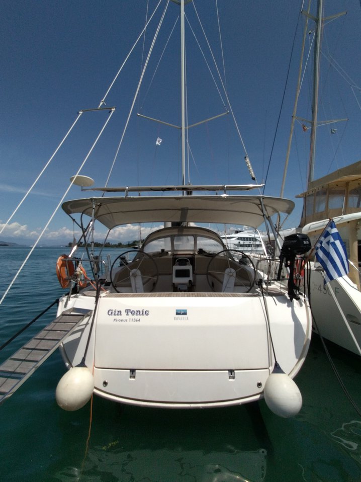 Sleek profile of Gin Tonic anchored, showcasing elegant lines and serene waters.