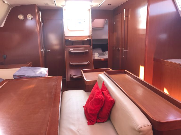 Elegant interior of Spica featuring warm wood tones, spacious layout, and natural light.