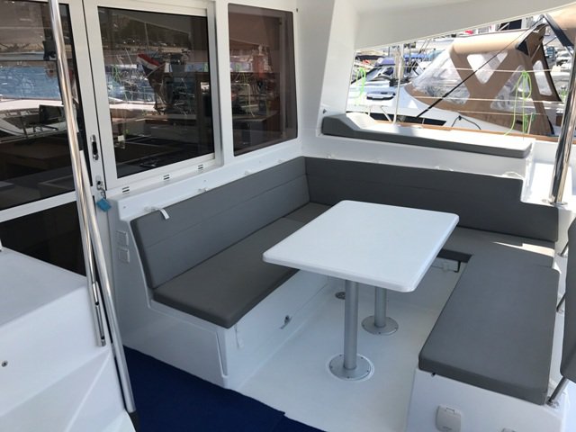 Stylish interior seating area on Tulip, featuring modern materials and bright lighting.