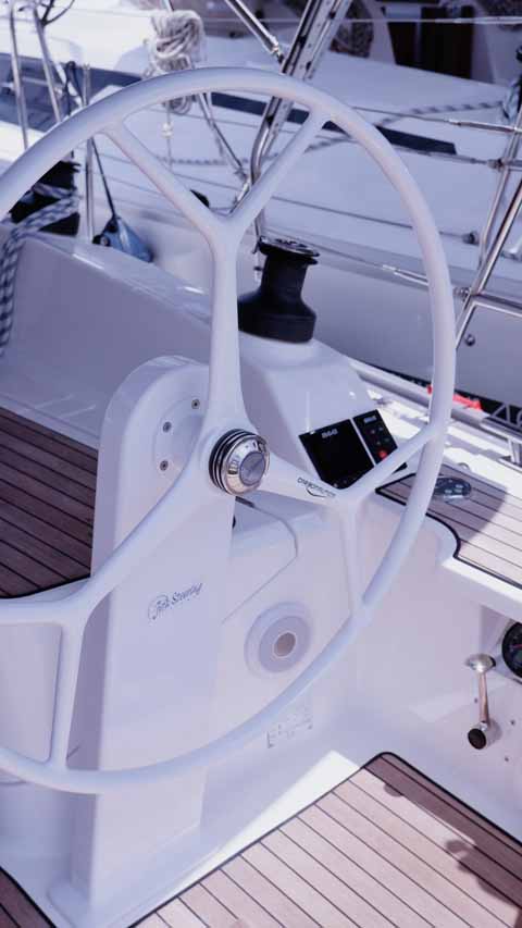 Sleek helm station of the Paloma, showcasing modern controls and elegant design.