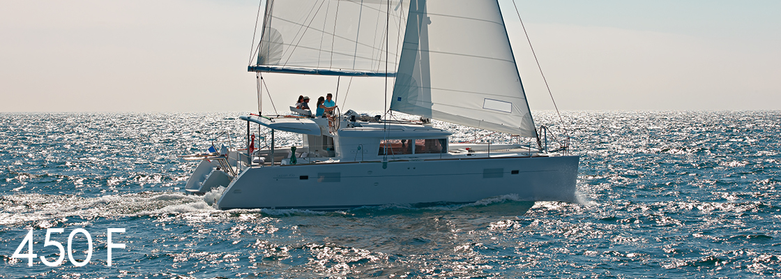 Sleek profile of the Metra sailing gracefully through azure waters, showcasing its elegant design.