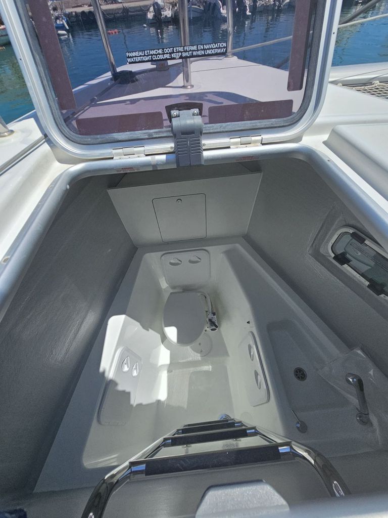 Spacious storage compartment on Kayian, featuring sleek lines and practical design.