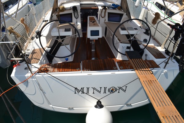Sleek cockpit of Minion showcasing dual steering wheels and modern navigation displays.