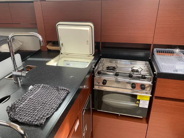 Sleek, modern galley aboard the Eugene, featuring high-end appliances and elegant finishes.