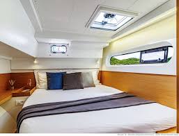 Luxurious cabin on Spearhead featuring elegant materials, soft lighting, and modern design.