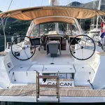 Sleek rear view of Cancan showcasing dual steering wheels and elegant outdoor seating.