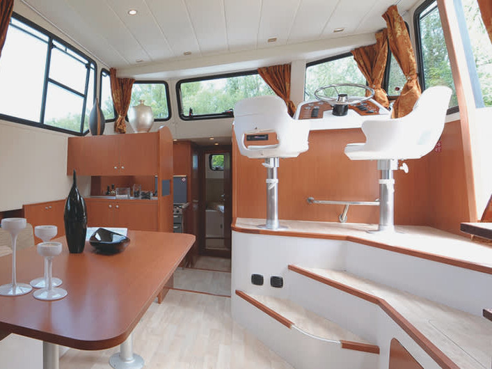 Elegant interior of Minuetto - Comfort 1 featuring warm wood tones and modern design.