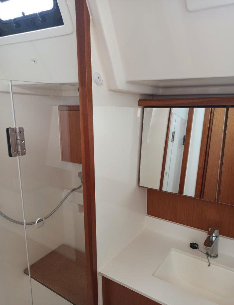 Luxurious bathroom in Nutmeg featuring elegant wood accents and modern fixtures.