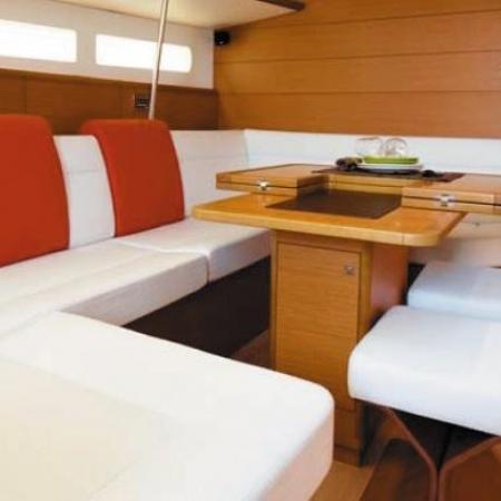 Luxurious interior of Verdi featuring elegant seating and warm wooden accents.