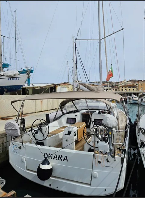 Sleek stern view of Ohana showcasing elegant deck layout and modern navigation equipment.