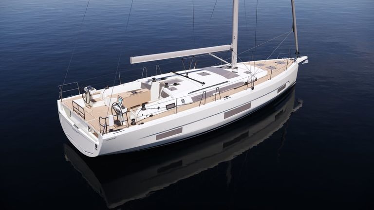 Sleek profile of Thalis II gliding over calm waters, showcasing elegant design and craftsmanship.